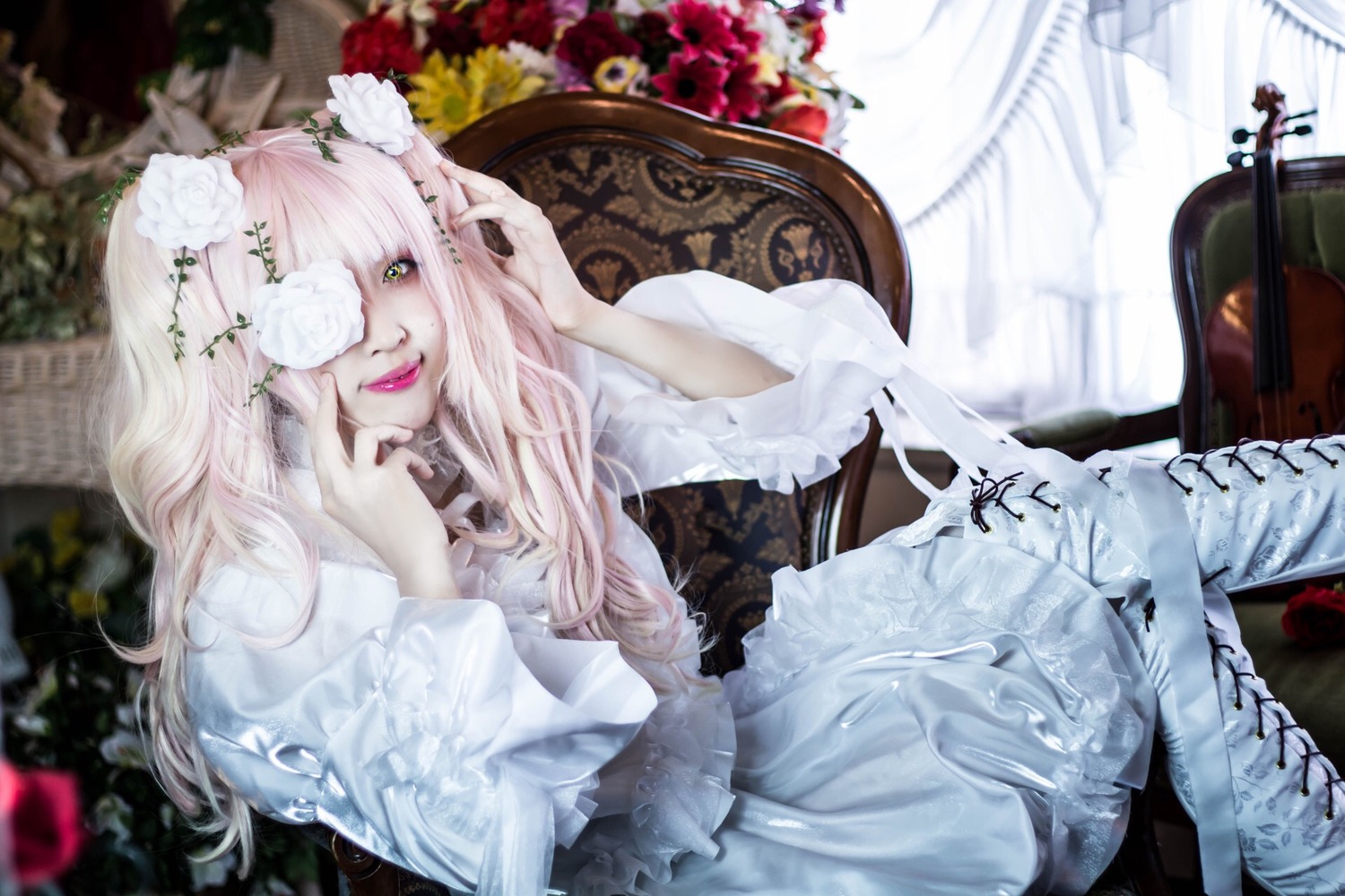 1girl blurry blurry_background blurry_foreground depth_of_field dress eyepatch flower frills green_eyes hair_flower hair_ornament kirakishou lips long_hair one_eye_covered pink_hair sitting solo white_dress white_hair