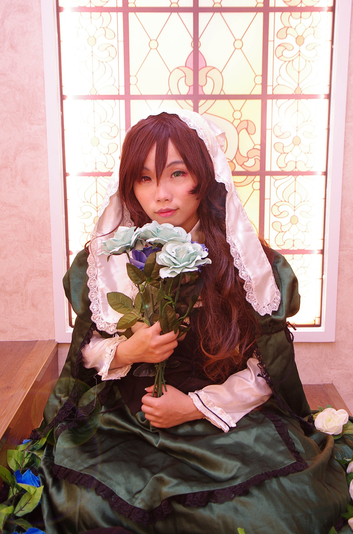 1girl brown_hair dress flower holding lips long_hair long_sleeves looking_at_viewer sitting solo suiseiseki window
