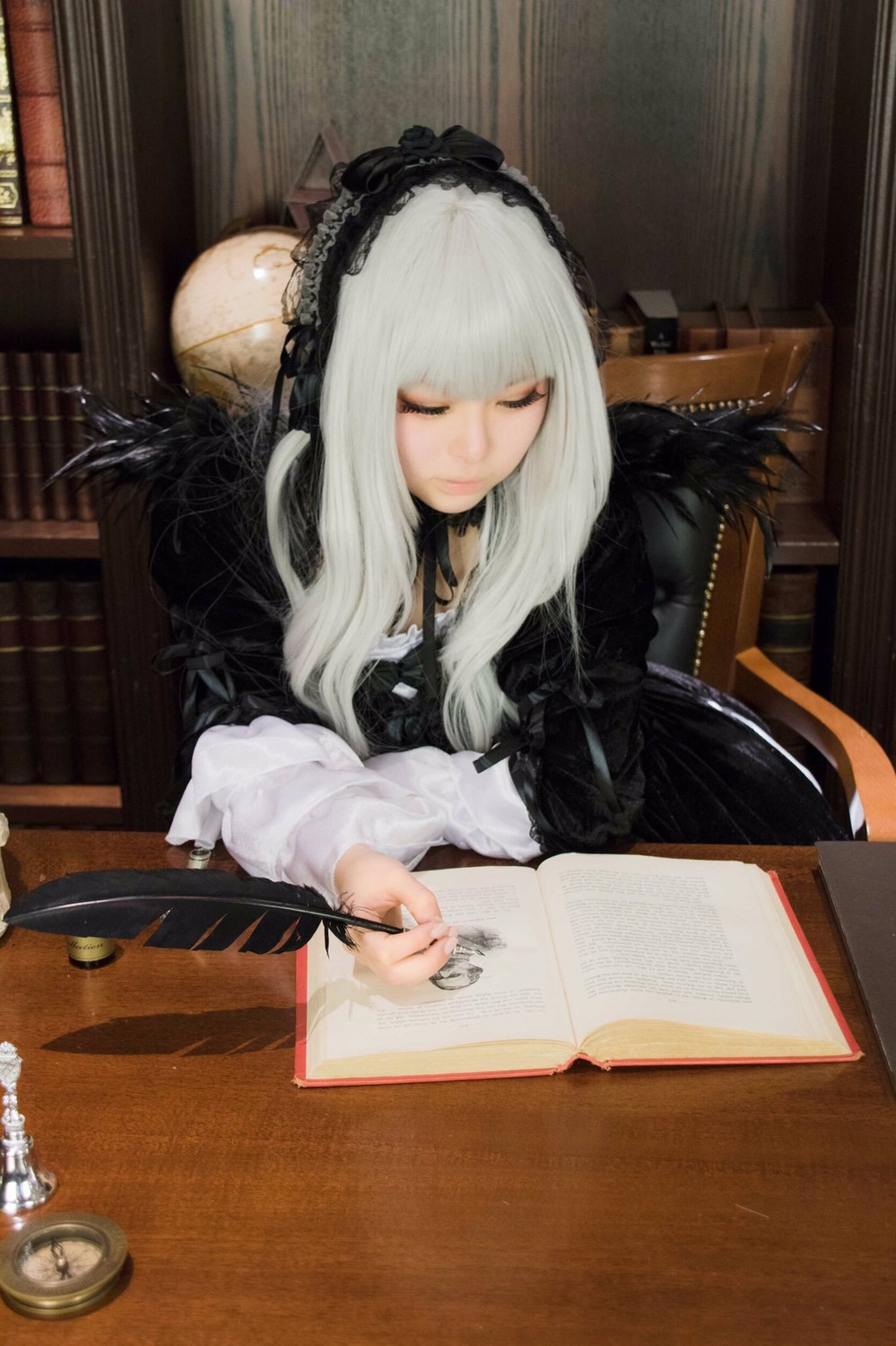 1girl bangs book bookshelf closed_eyes dress feathers gothic_lolita lace lolita_fashion long_hair sitting solo suigintou white_hair