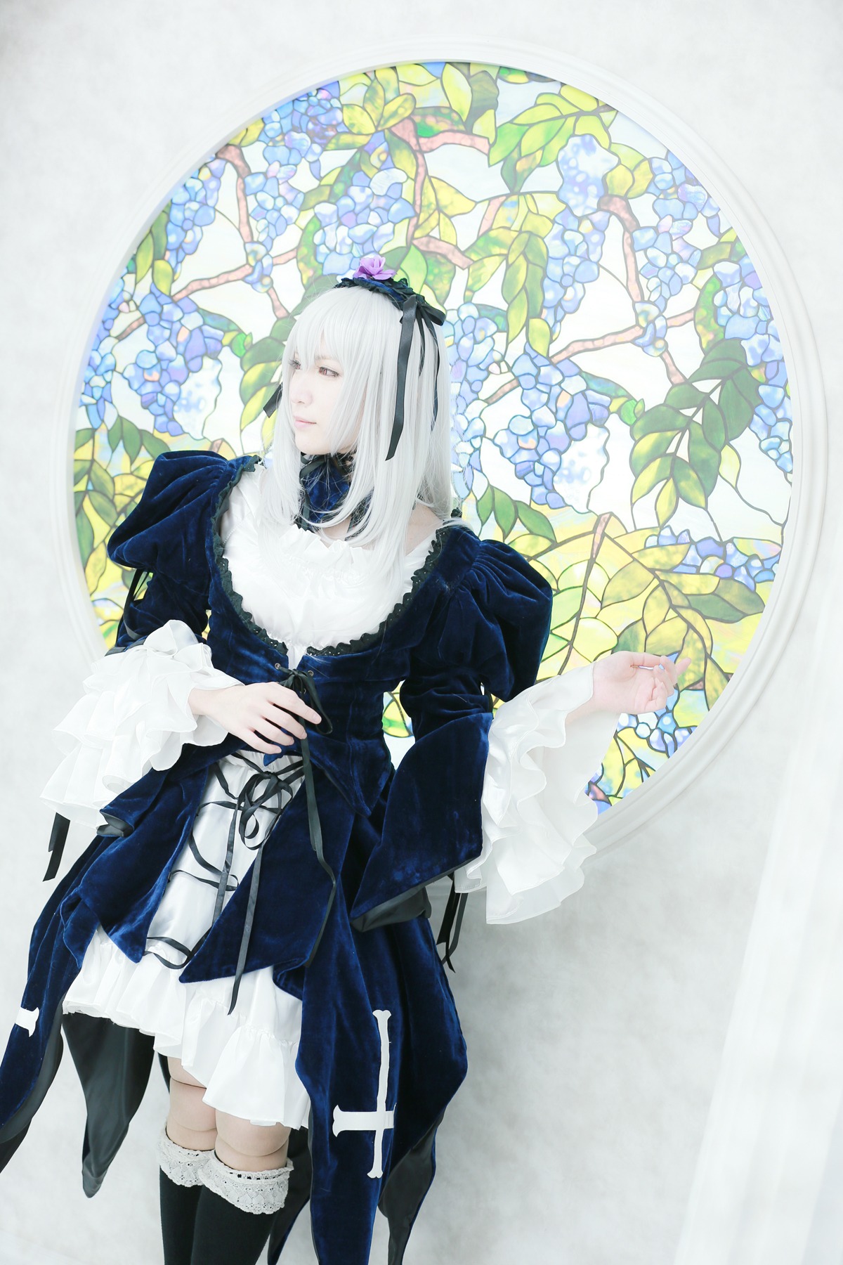 1girl bangs dress flower frills gothic_lolita hairband lace lolita_fashion long_hair long_sleeves ribbon solo suigintou