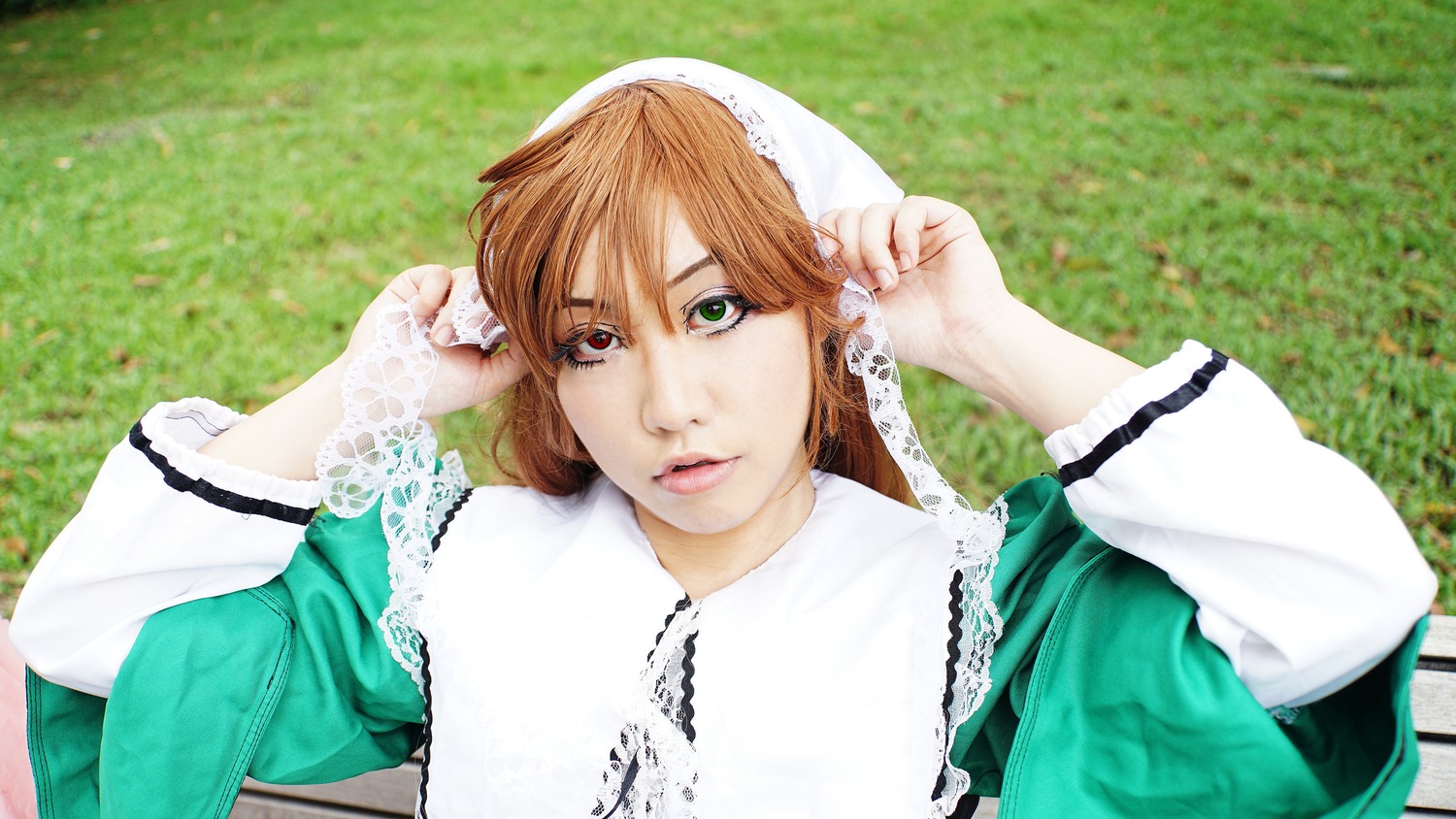 1girl brown_hair green_dress green_eyes head_scarf heterochromia lips long_sleeves looking_at_viewer red_eyes solo suiseiseki upper_body