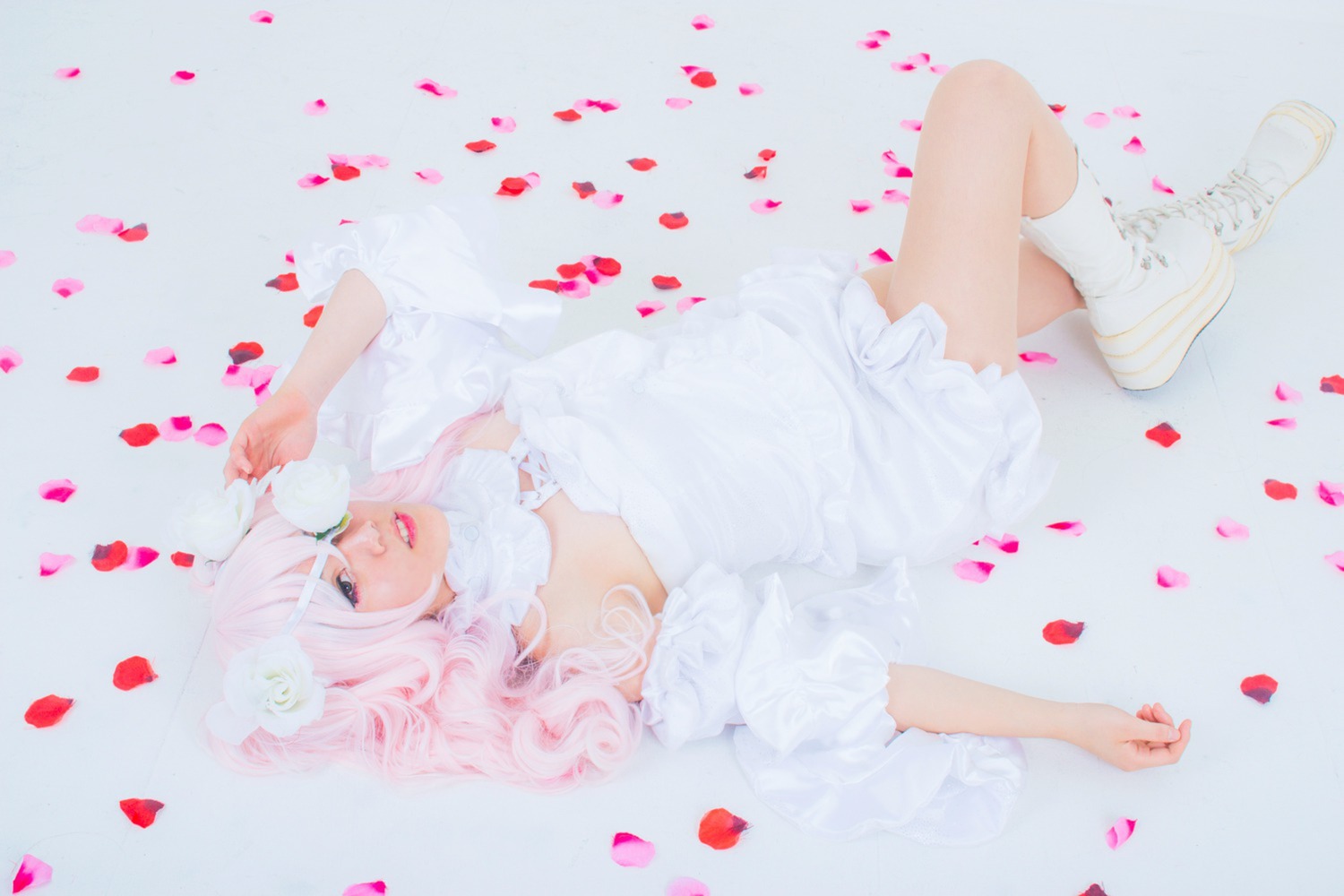 1girl flower kirakishou lips long_hair petals pink_hair pinstripe_pattern ribbed_legwear rose_petals socks solo striped striped_legwear vertical-striped_dress vertical-striped_legwear vertical_stripes