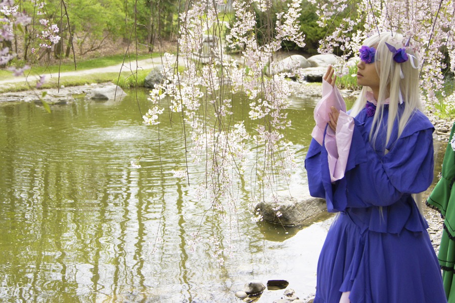 1girl barasuishou blonde_hair field flower long_hair school_uniform skirt solo standing