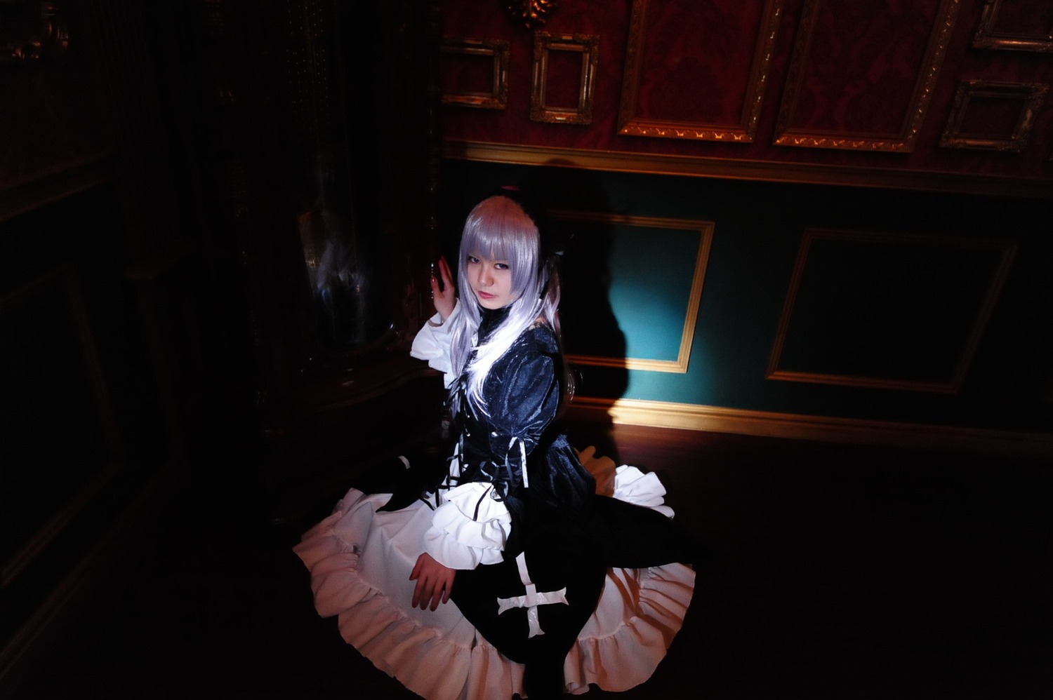 1girl blood dress indoors long_hair sitting solo suigintou