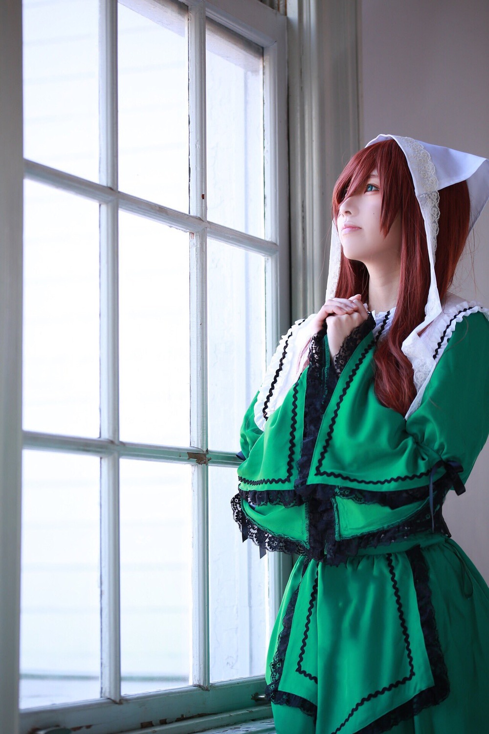 1girl blue_eyes dress from_side green_dress indoors long_hair long_sleeves profile solo standing suiseiseki window