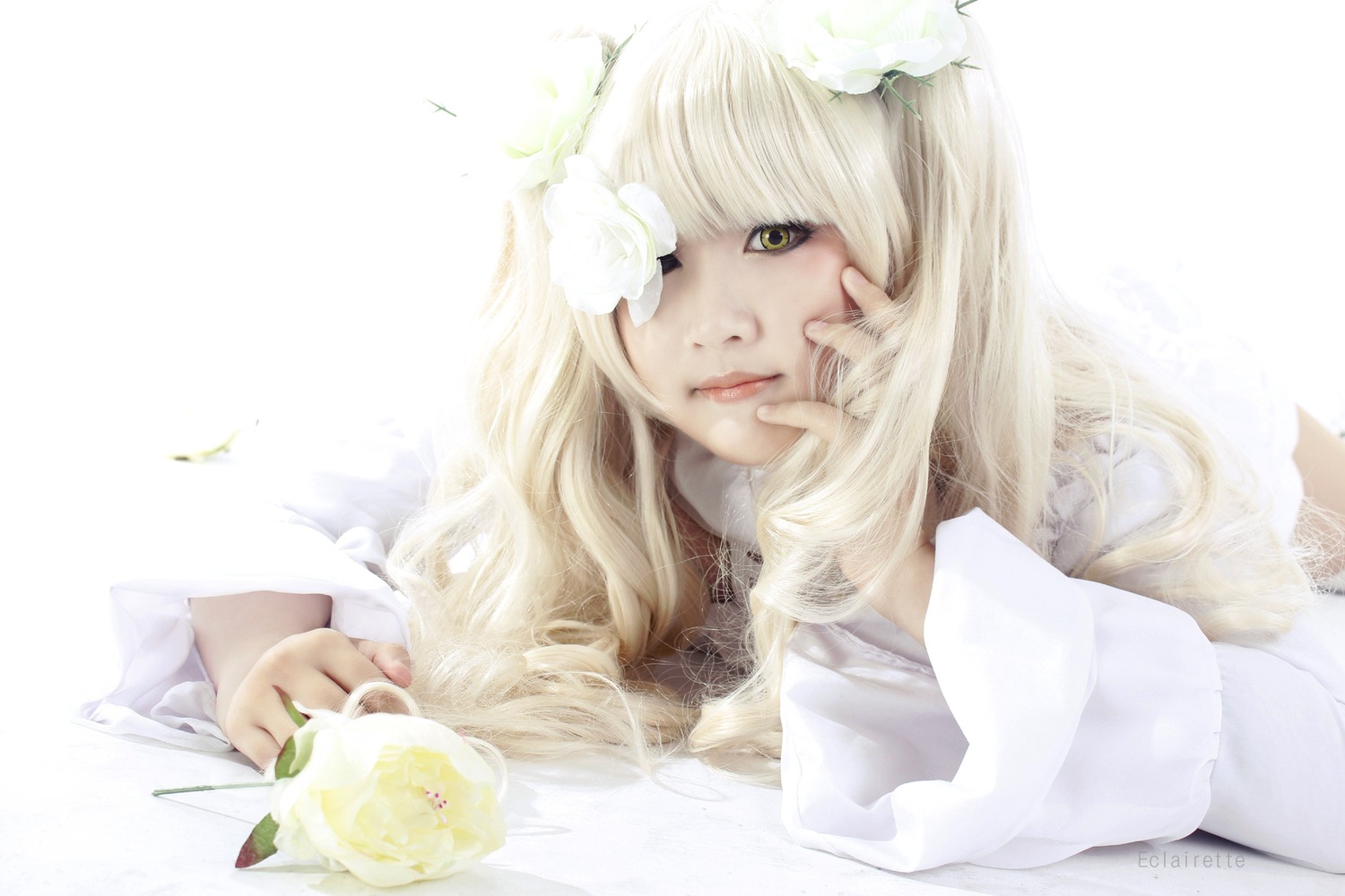 1girl bangs blonde_hair flower food fruit hair_flower hair_ornament kirakishou lips long_hair realistic solo striped striped_shirt vertical_stripes yellow_eyes