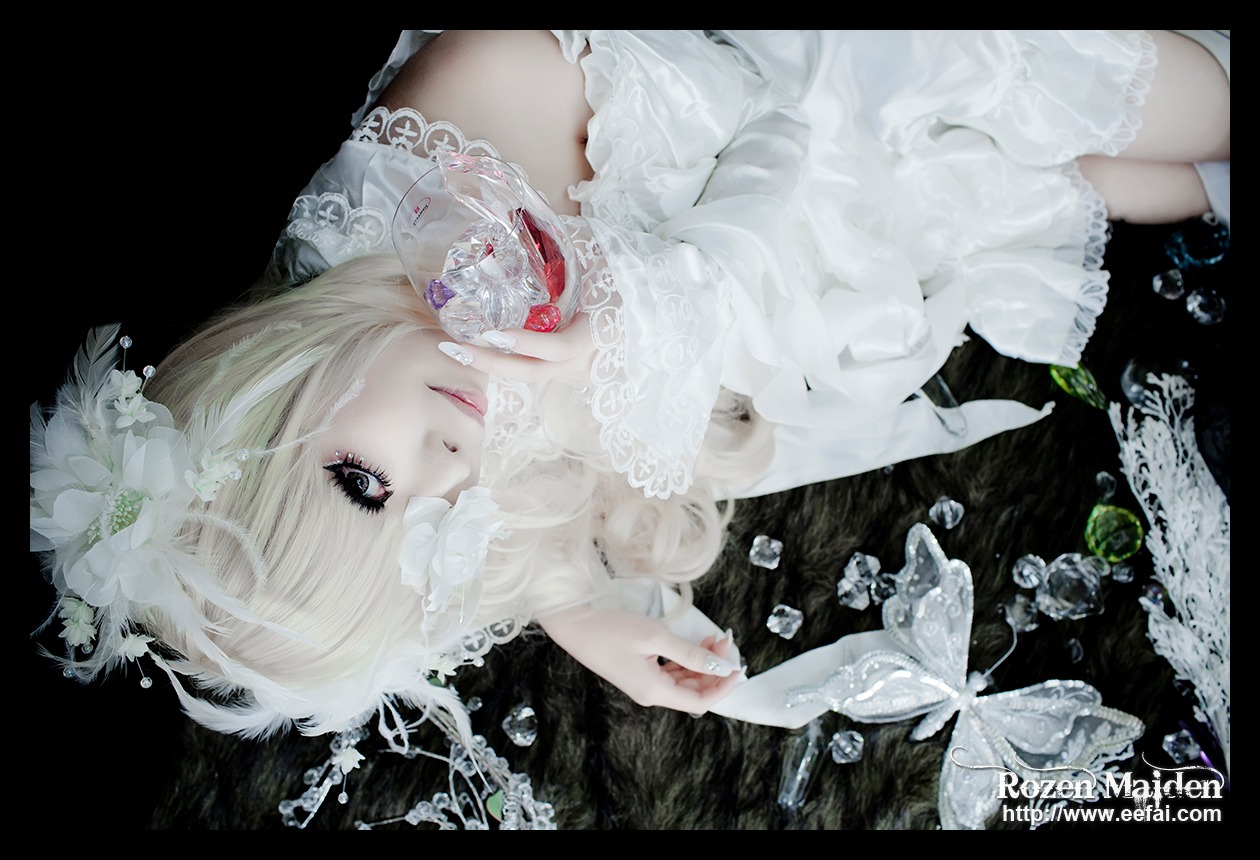 1girl auto_tagged blonde_hair blue_eyes bug butterfly dress flower hair_over_one_eye insect kirakishou letterboxed lips solo white_dress