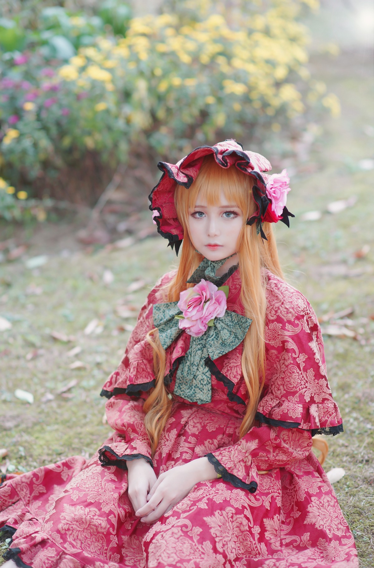 1girl blonde_hair blue_eyes blurry blurry_background depth_of_field floral_print flower japanese_clothes lips long_hair looking_at_viewer shinku sitting solo