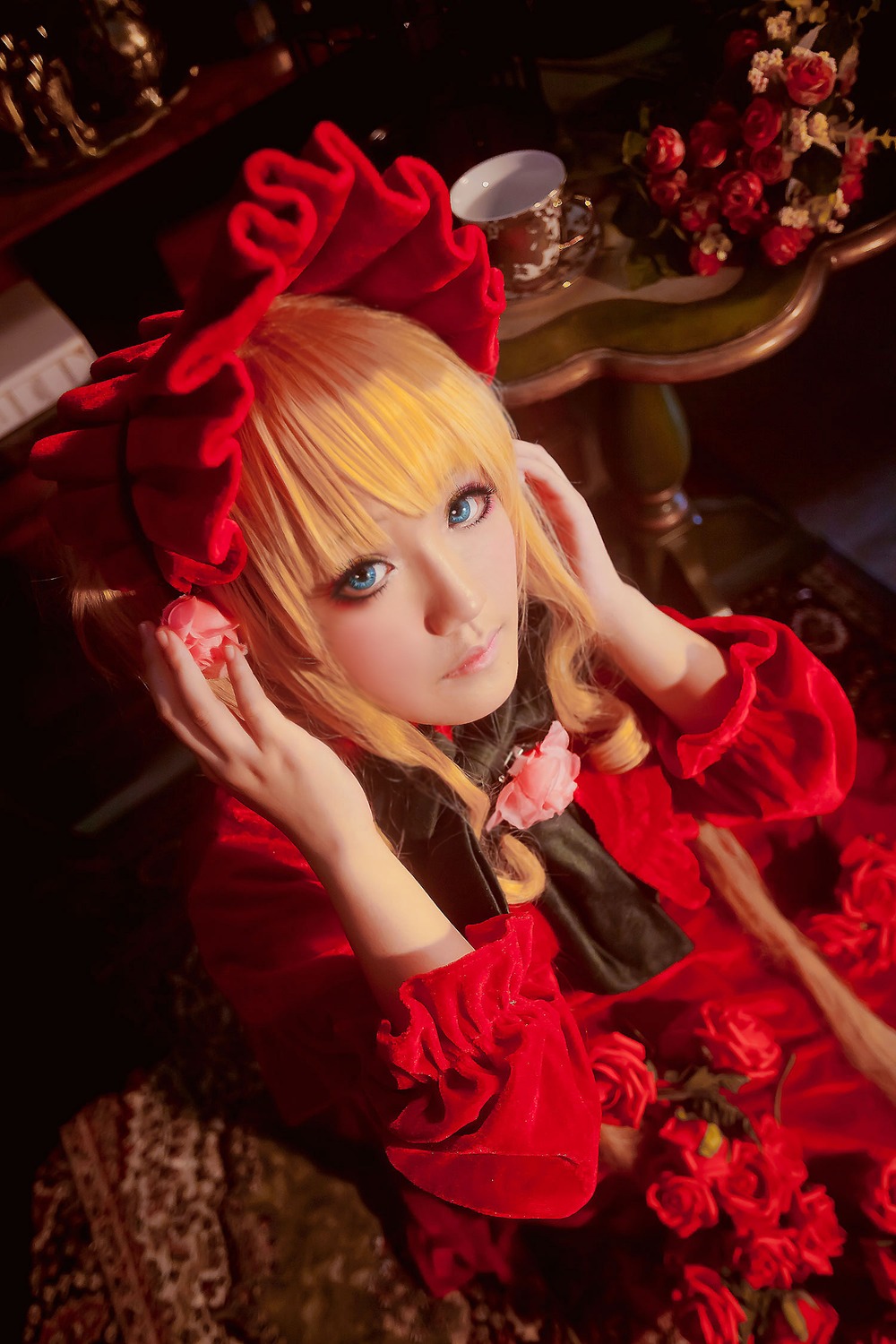 1girl blonde_hair blue_eyes dress flower lips lolita_fashion realistic red_dress red_flower red_rose rose shinku solo upper_body