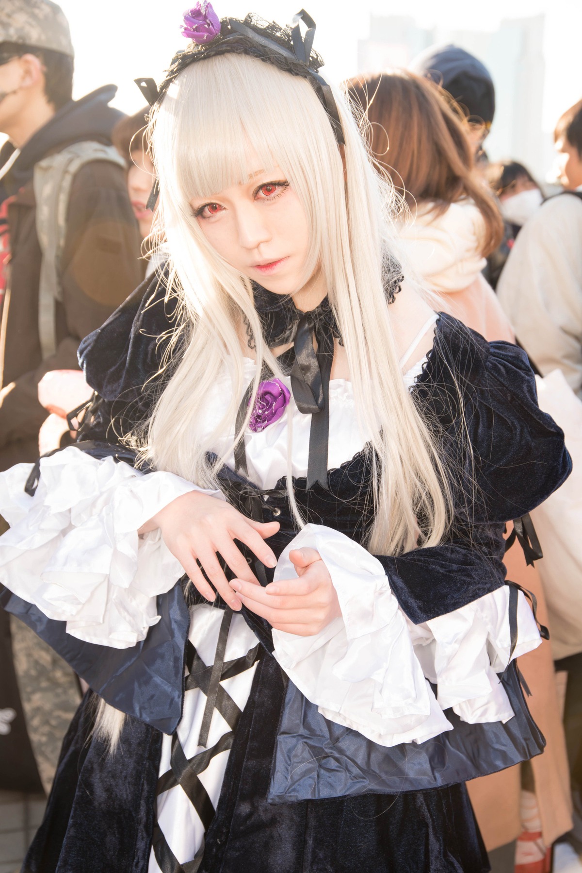 1girl bangs blonde_hair blurry closed_mouth dress frills hairband lace lips lolita_fashion long_hair long_sleeves looking_at_viewer red_eyes solo suigintou
