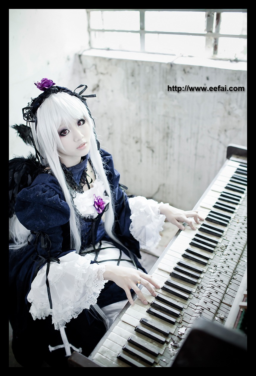 1girl black_border dress flower frills instrument letterboxed music nail_polish pale_skin piano playing_instrument silver_hair solo suigintou wings