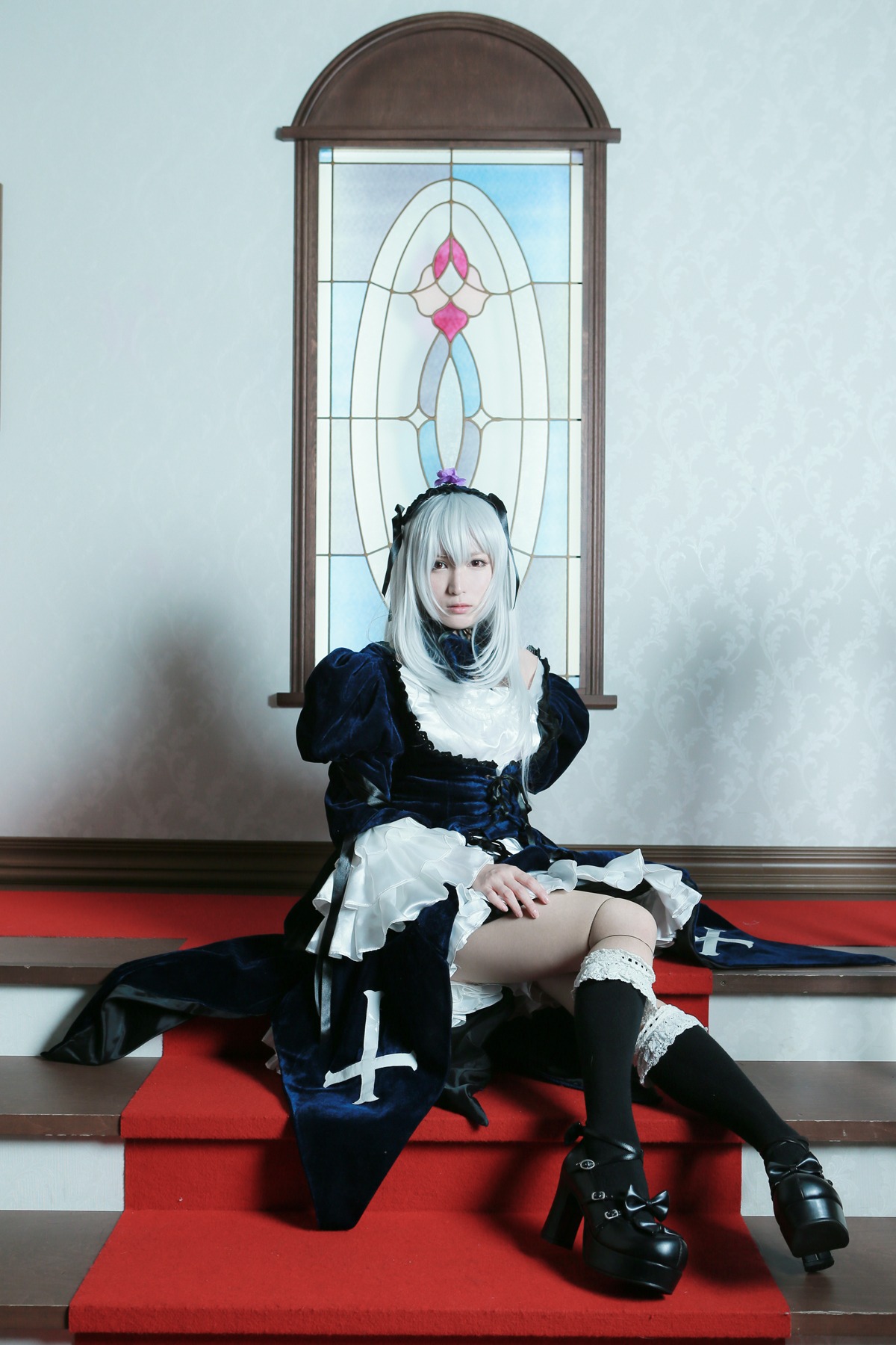 1girl black_footwear black_legwear boots dress frills high_heels long_hair long_sleeves sitting solo suigintou