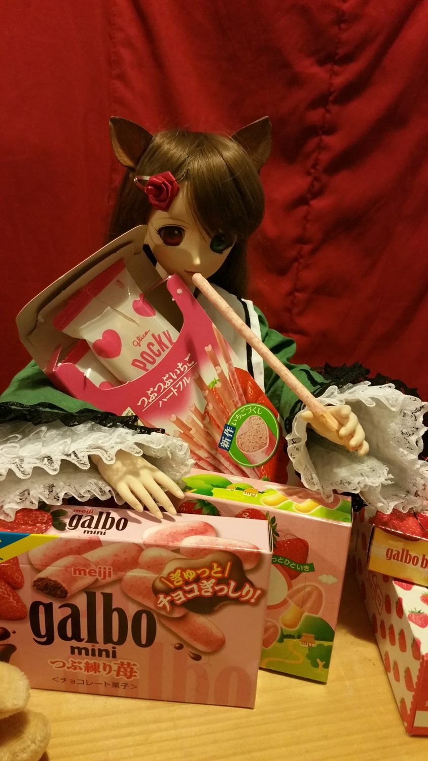 1girl animal_ears doll dress flower food frills hair_flower hair_ornament solo suiseiseki