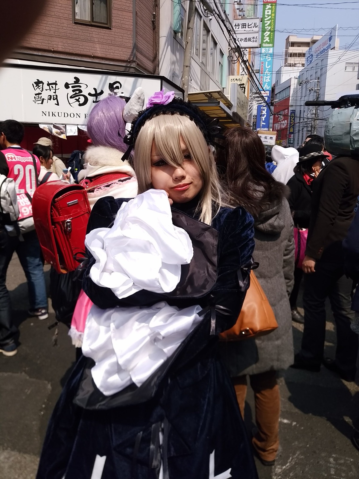 bag blonde_hair city maid_headdress multiple_boys multiple_girls outdoors solo suigintou