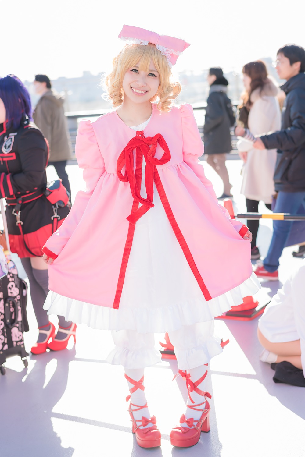 black_shirt blonde_hair blurry blurry_background blurry_foreground bow depth_of_field dress hat hinaichigo long_sleeves multiple_boys multiple_girls ribbon short_hair smile solo standing thighhighs
