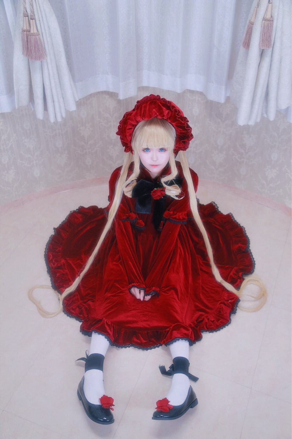 1girl bangs blonde_hair blue_eyes bonnet curtains dress flower lolita_fashion long_hair long_sleeves looking_at_viewer red_dress red_flower red_rose rose shinku shoes sitting solo