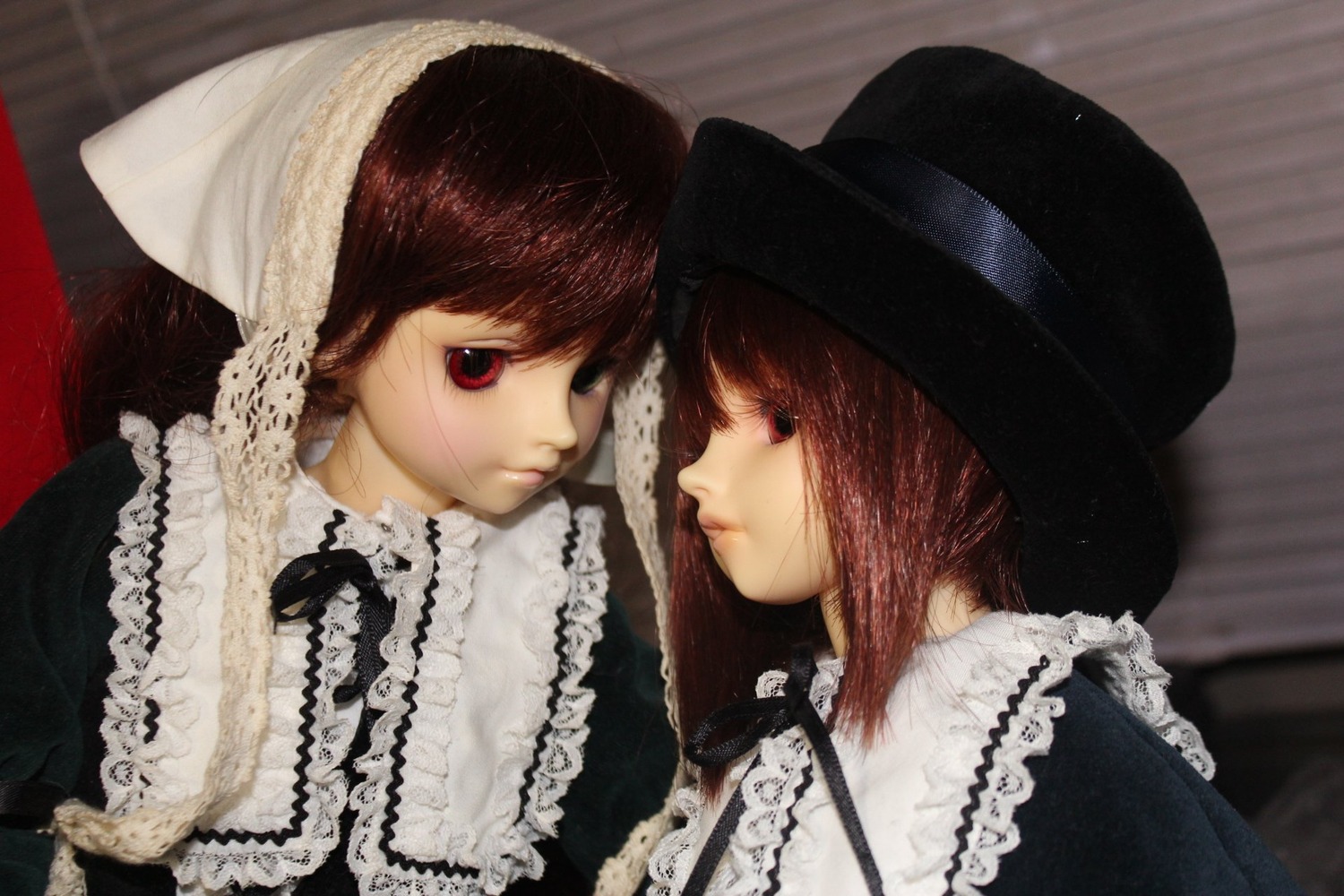 2girls bangs brown_hair doll frills hat lace looking_at_viewer multiple_dolls multiple_girls red_eyes siblings sisters tagme twins