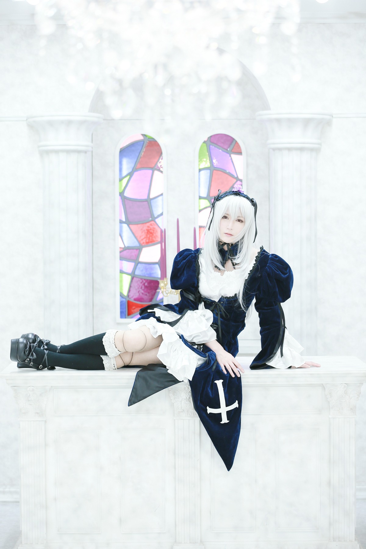 1girl black_dress black_footwear boots closed_eyes dress frills long_hair long_sleeves sitting solo suigintou umbrella union_jack white_hair