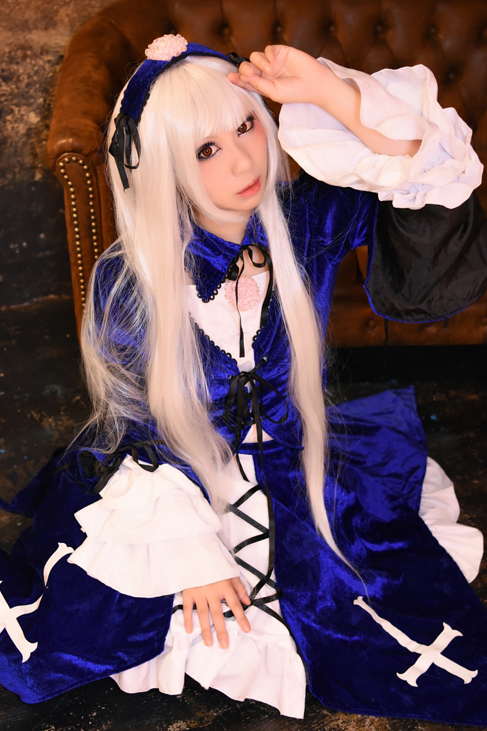 1girl bangs dress frilled_sleeves frills hairband lace lips long_hair long_sleeves looking_at_viewer red_eyes sitting solo suigintou wide_sleeves