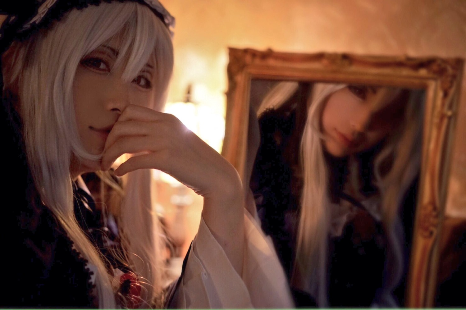 1girl 2girls bangs black_dress blonde_hair blurry closed_mouth depth_of_field dress indoors lips long_hair multiple_girls smile solo suigintou window