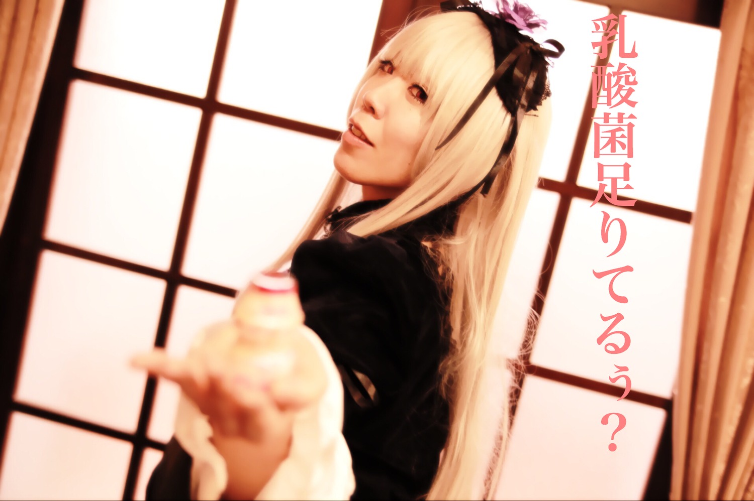 1girl blonde_hair blurry depth_of_field flower frills gothic_lolita hairband indoors lolita_fashion long_hair long_sleeves looking_at_viewer red_eyes shouji solo suigintou window