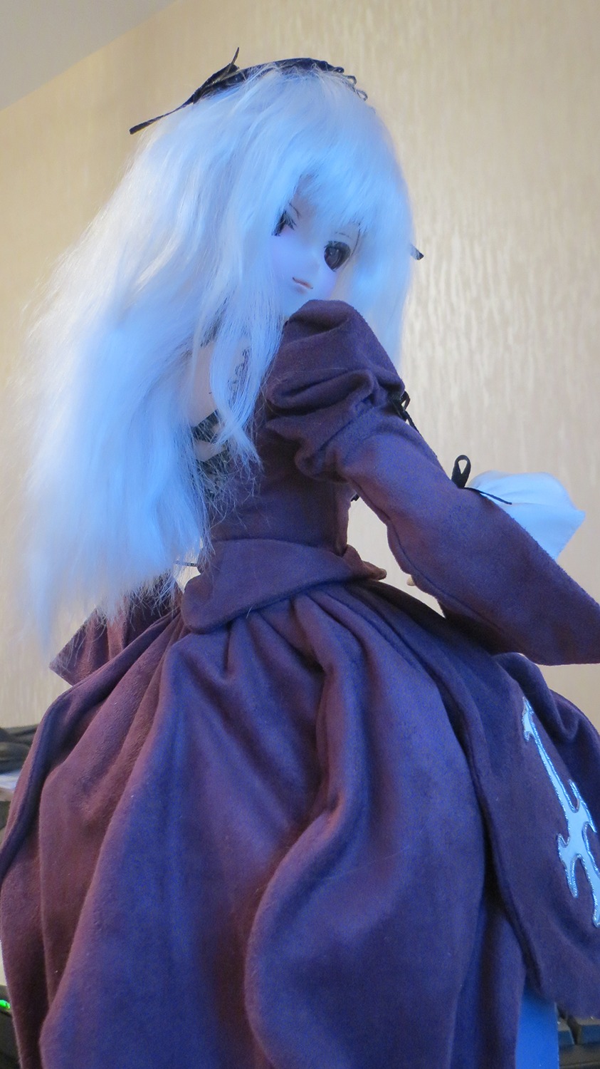 1girl blue_dress doll dress long_hair long_sleeves looking_at_viewer puffy_sleeves solo standing suigintou white_hair