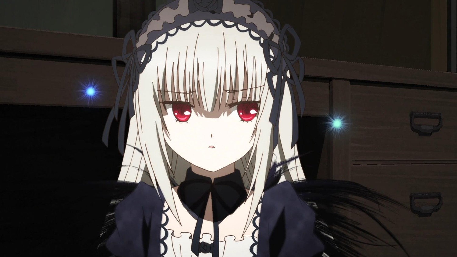 1girl bangs black_dress black_ribbon black_wings detached_collar dress eyebrows_visible_through_hair hair_between_eyes hairband image long_hair long_sleeves looking_at_viewer parted_lips red_eyes ribbon silver_hair solo suigintou wings