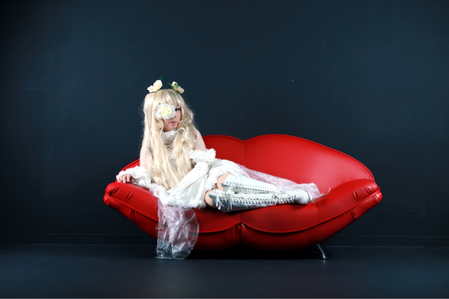 1girl blonde_hair boots couch dress kirakishou long_hair sitting solo