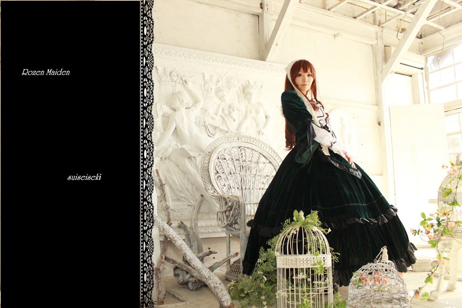 1girl black_dress brown_hair building dress long_hair long_sleeves looking_at_viewer solo standing suiseiseki