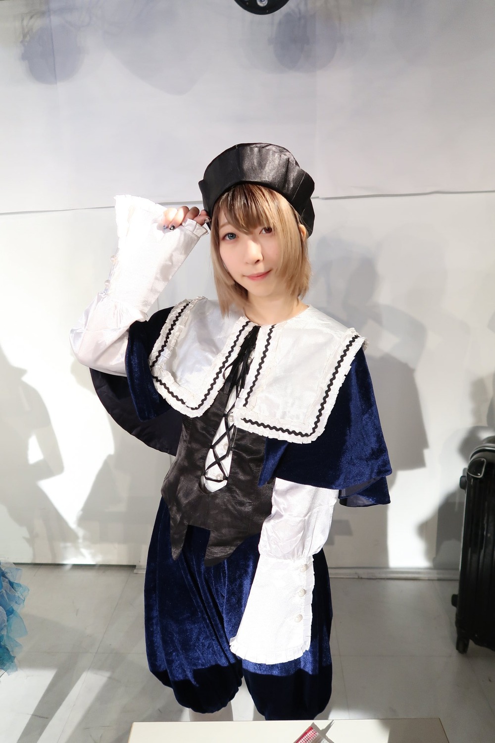 1girl 3d blonde_hair capelet dress hat lips long_sleeves looking_at_viewer photo realistic short_hair solo souseiseki