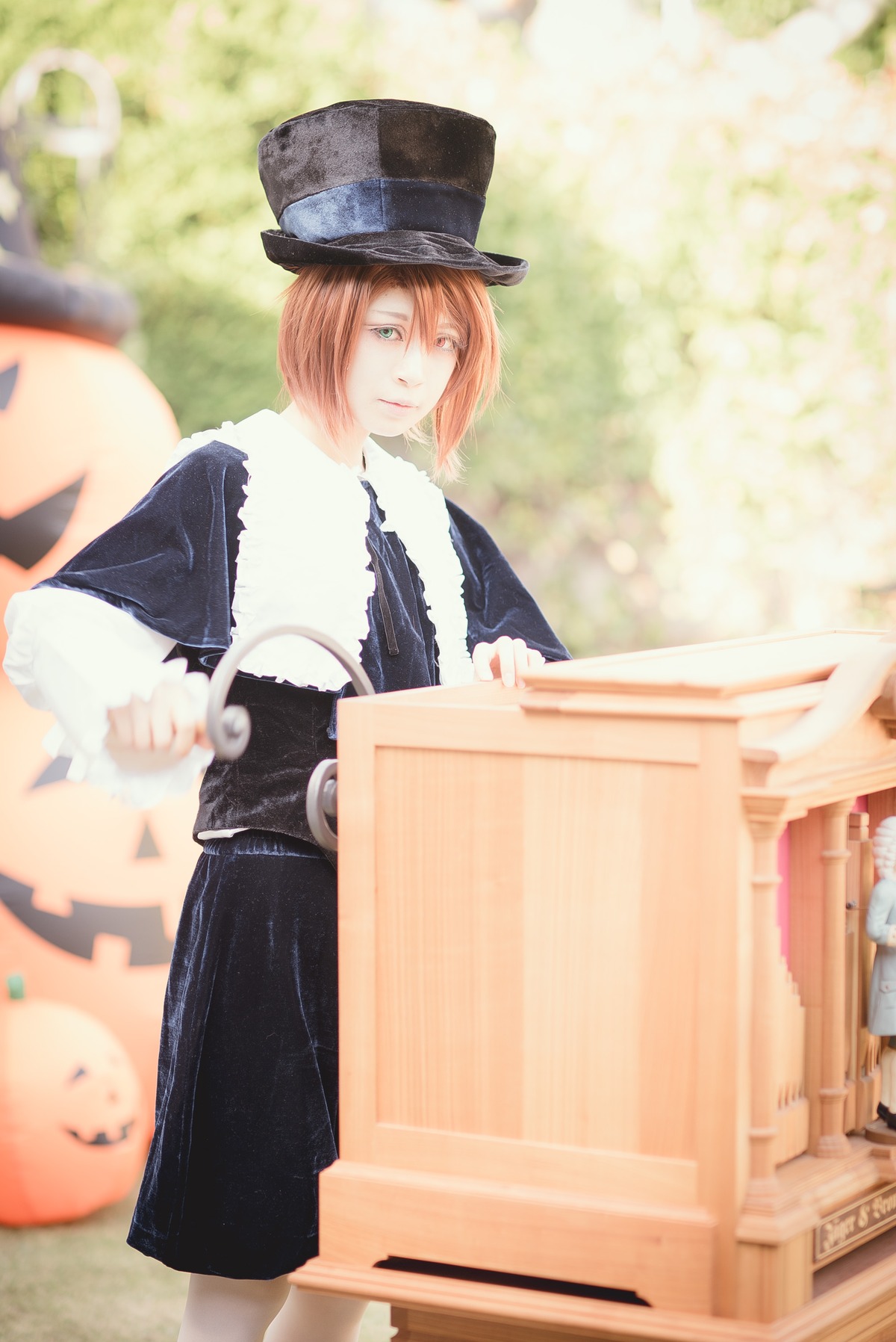 1girl black_headwear blurry blurry_background blurry_foreground depth_of_field hat long_sleeves looking_at_viewer short_hair solo souseiseki standing