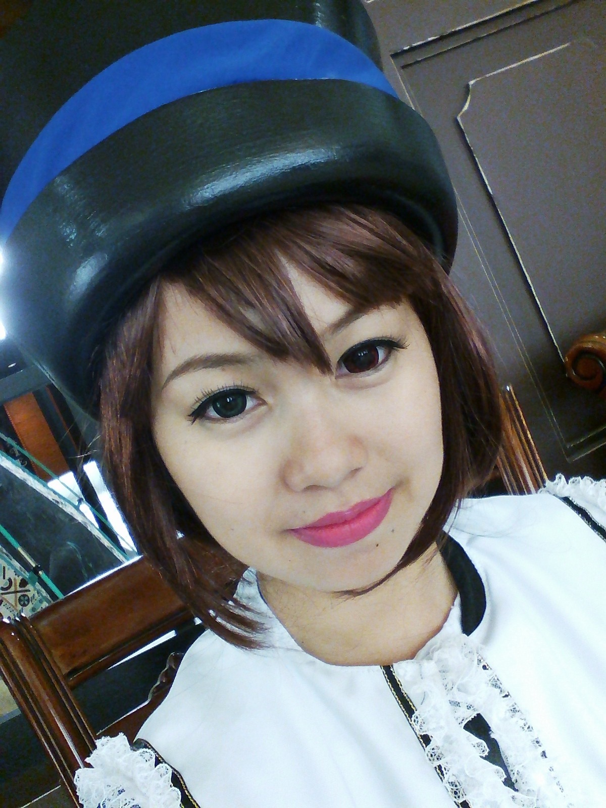 1girl beret blue_headwear brown_eyes brown_hair closed_mouth hat lips looking_at_viewer photo portrait short_hair smile solo souseiseki traditional_media