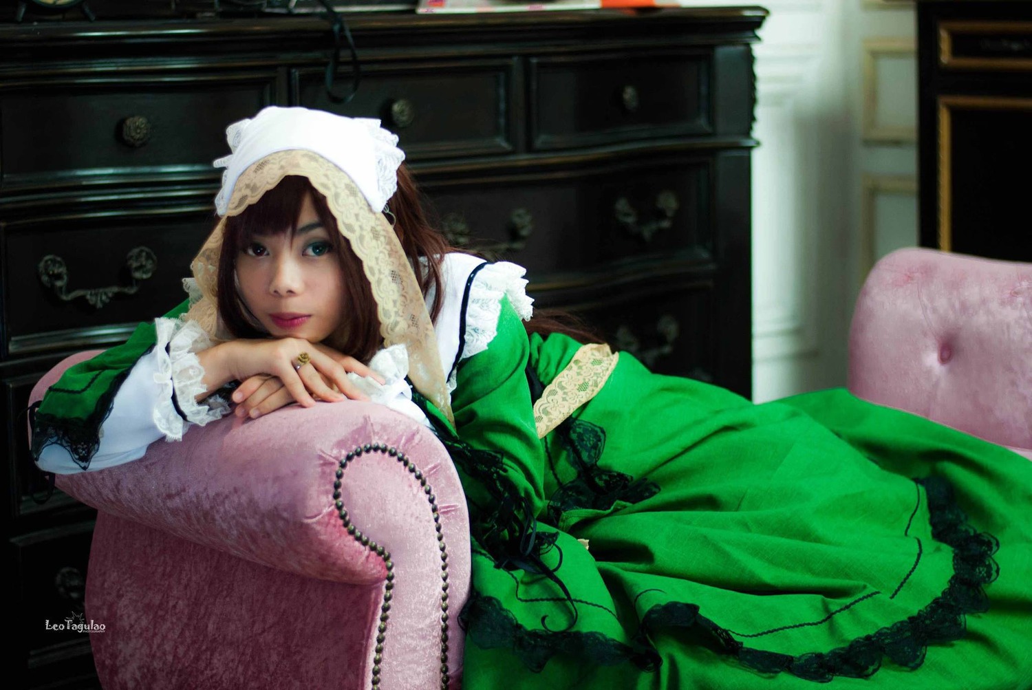 1girl blue_eyes brown_hair dress frills green_dress indoors lips looking_at_viewer nail_polish solo suiseiseki