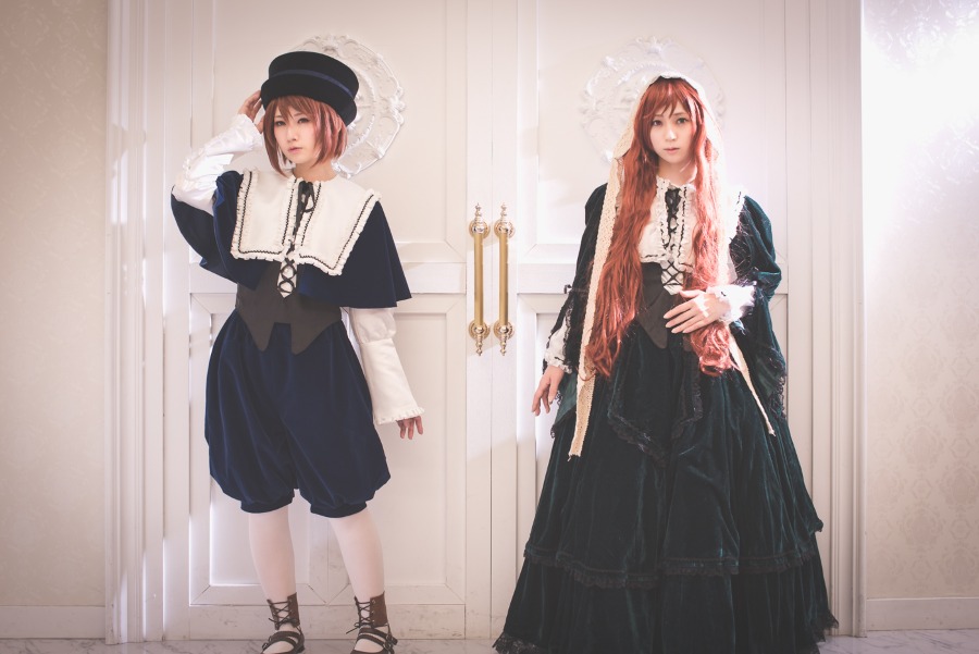 2girls bangs boots brown_hair dress hat long_hair long_sleeves looking_at_viewer megurine_luka multiple_cosplay multiple_girls pink_hair short_hair sisters standing striped tagme twins white_legwear