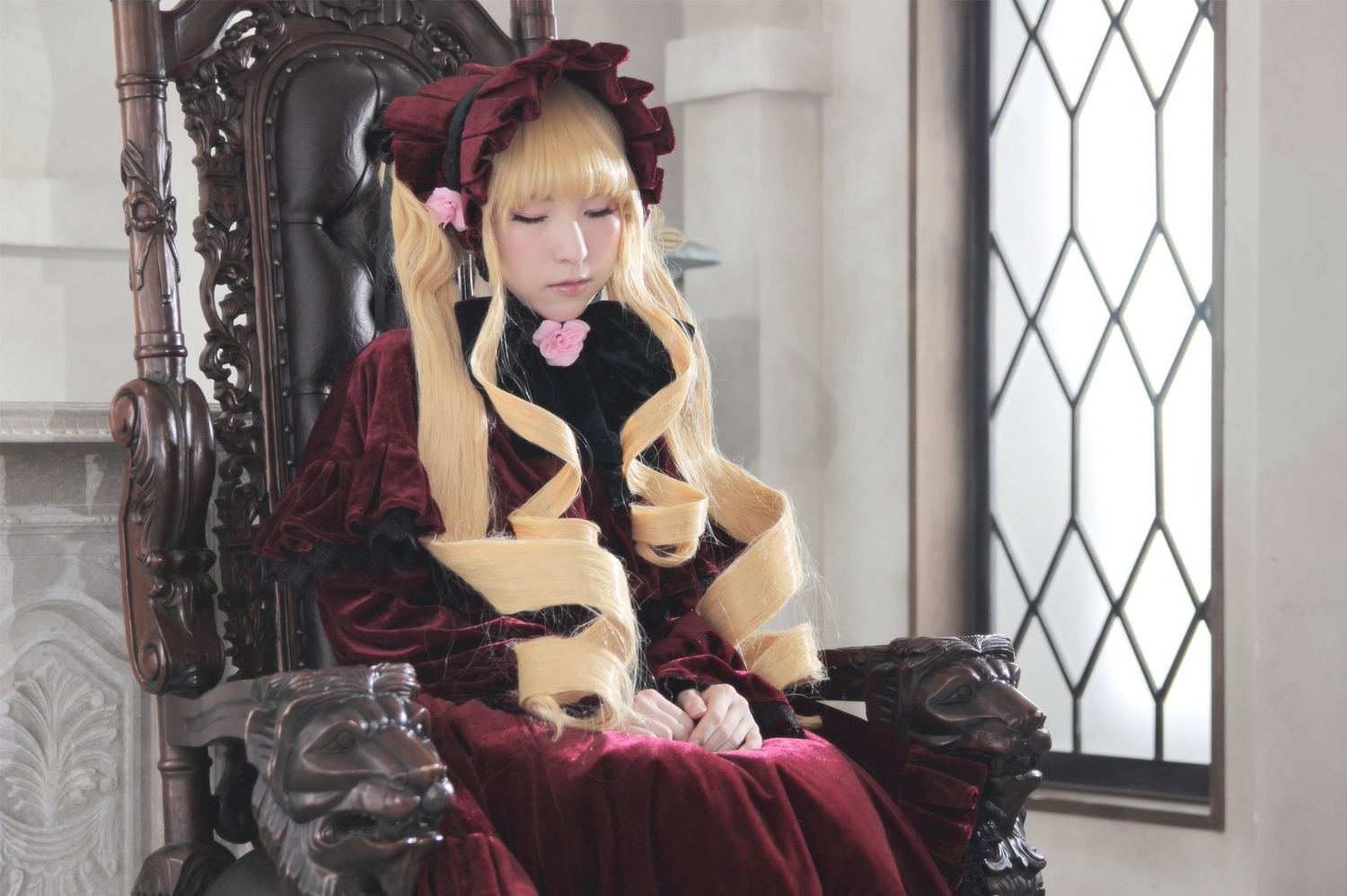 1girl blonde_hair bonnet closed_eyes dress long_hair long_sleeves red_dress shinku sitting sleeping solo twintails