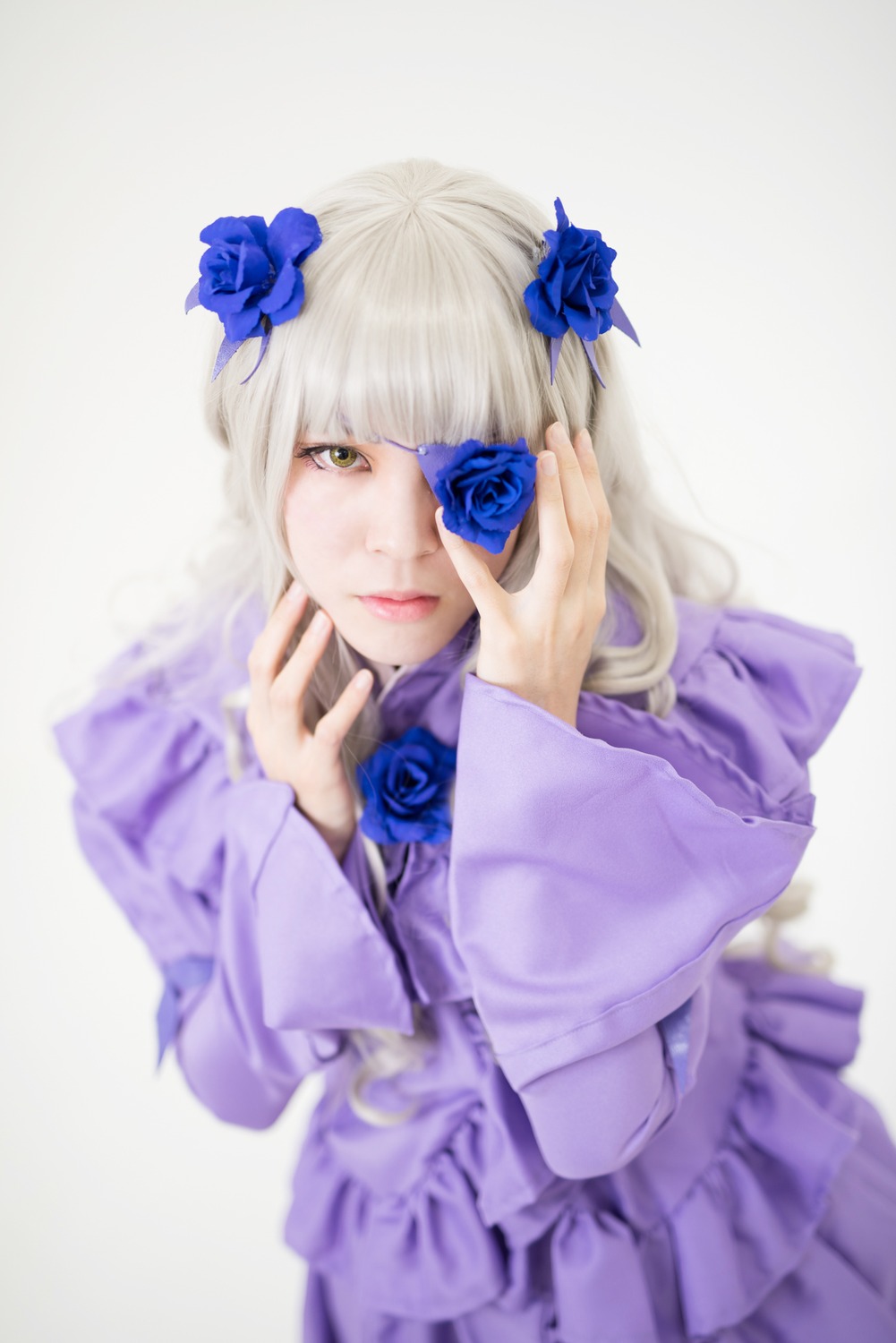 1girl barasuishou blue_flower blue_rose blurry depth_of_field flower long_hair looking_at_viewer rose solo striped