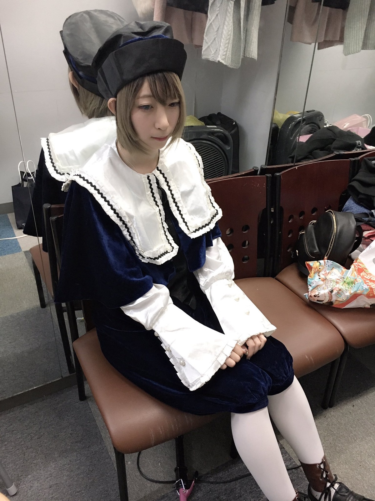 1girl 3d blonde_hair book chair dress hat indoors sitting solo souseiseki