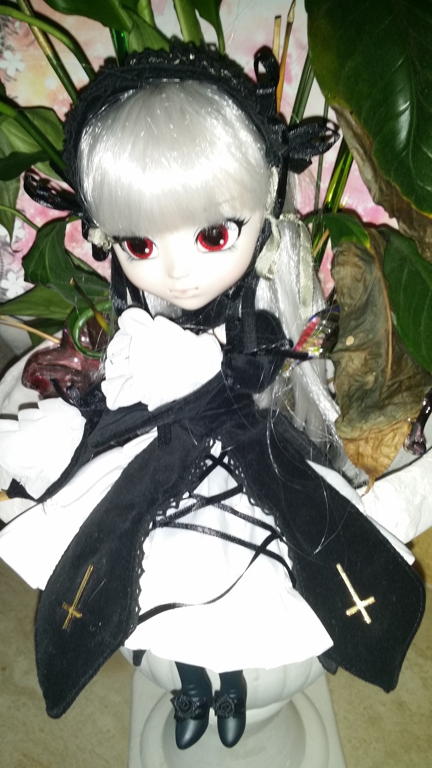 1girl bangs blunt_bangs doll dress flower long_hair long_sleeves looking_at_viewer red_eyes solo suigintou white_hair
