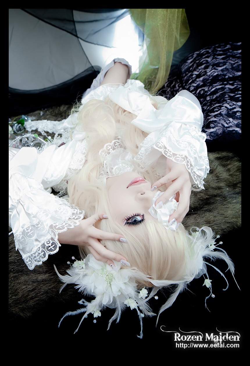 1girl auto_tagged black_background blonde_hair blue_eyes flower hands kirakishou lace letterboxed lips long_sleeves nail_polish solo