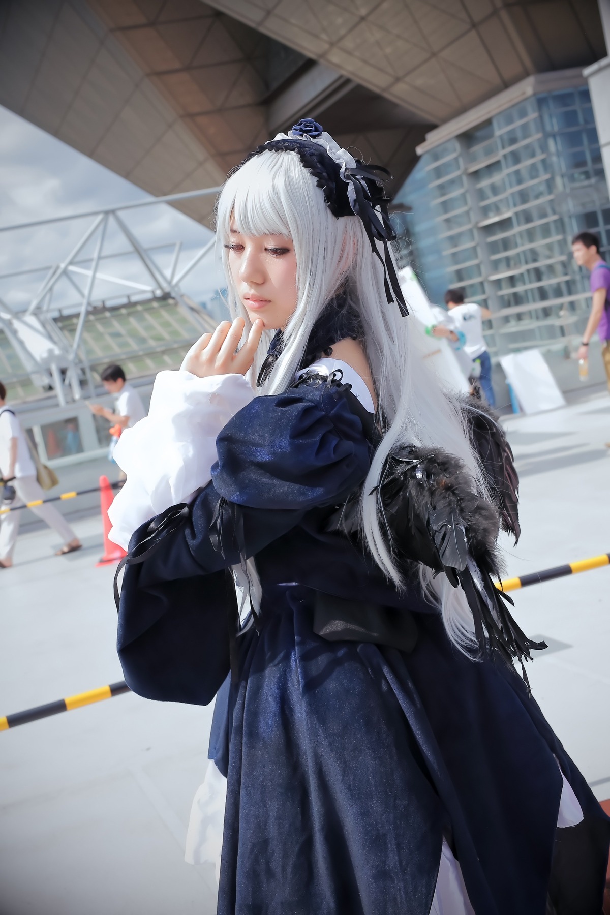 1girl 3d blurry blurry_background closed_eyes depth_of_field dress gothic_lolita hairband long_hair multiple_girls photo solo_focus suigintou