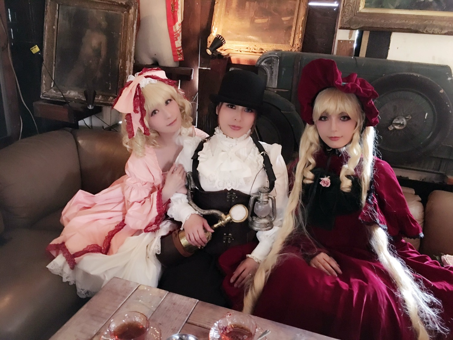 3girls black_eyes black_hair blonde_hair bow couch dress hat long_hair looking_at_viewer multiple_cosplay multiple_girls painting_(object) sitting smile tagme