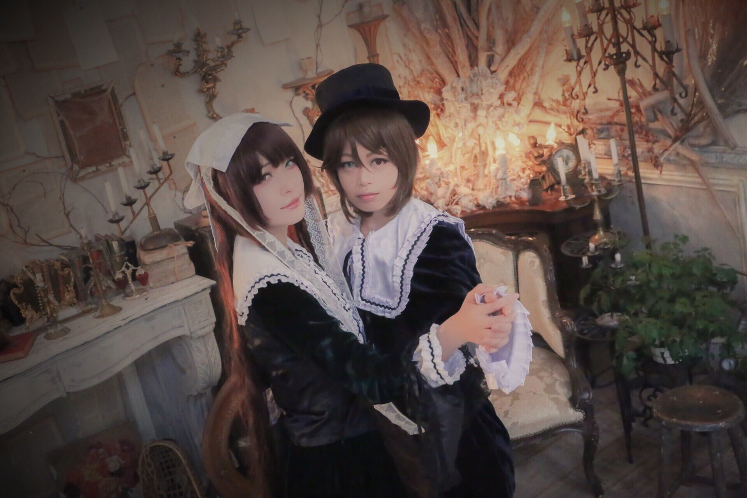 2girls bangs black_dress brown_hair candle candlestand chair dress hat indoors lips long_hair multiple_cosplay multiple_girls plant table tagme vase