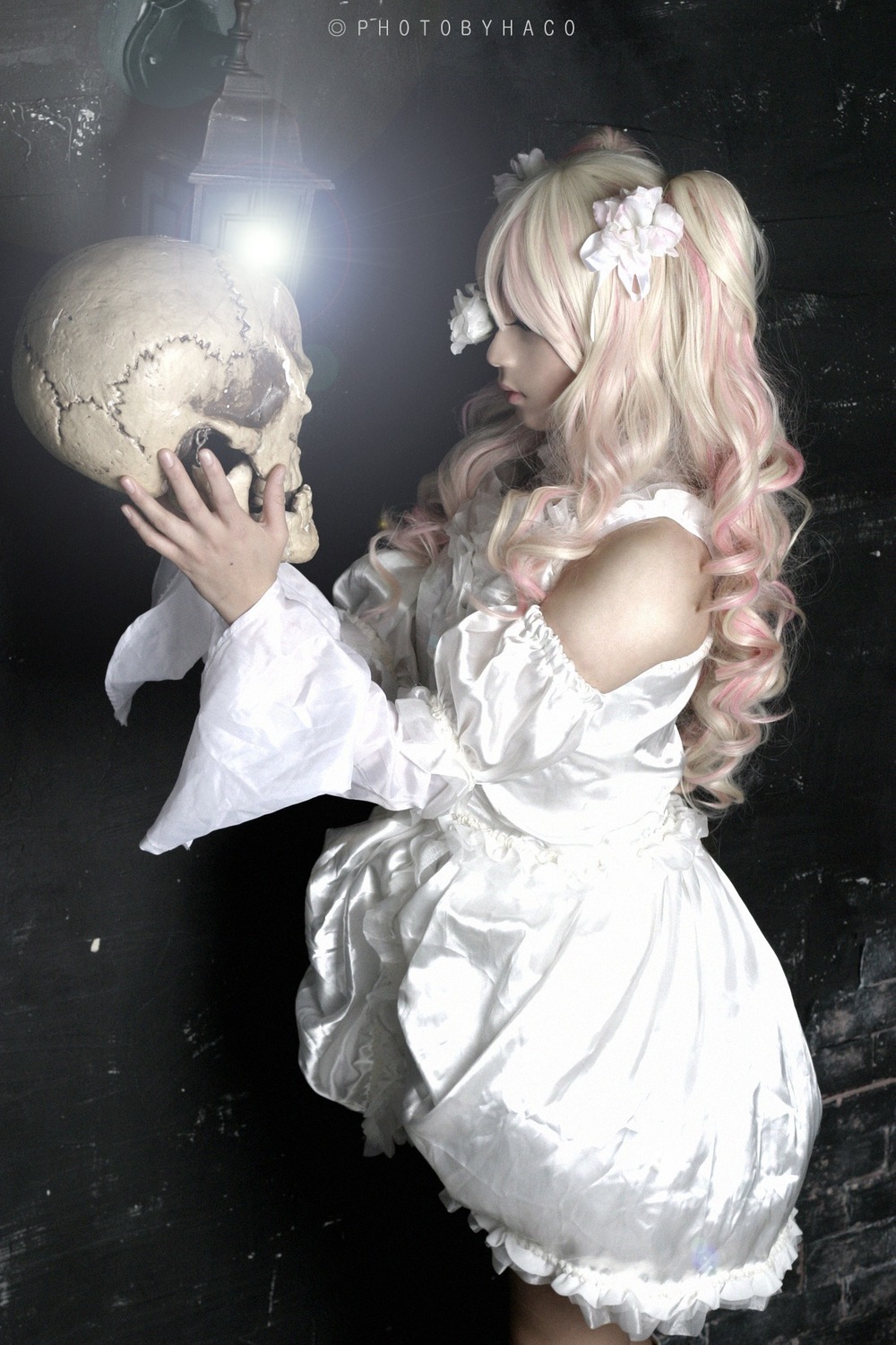 1girl bare_shoulders blonde_hair dress flower frills hair_flower hair_ornament holding kirakishou lips long_hair skull solo white_dress