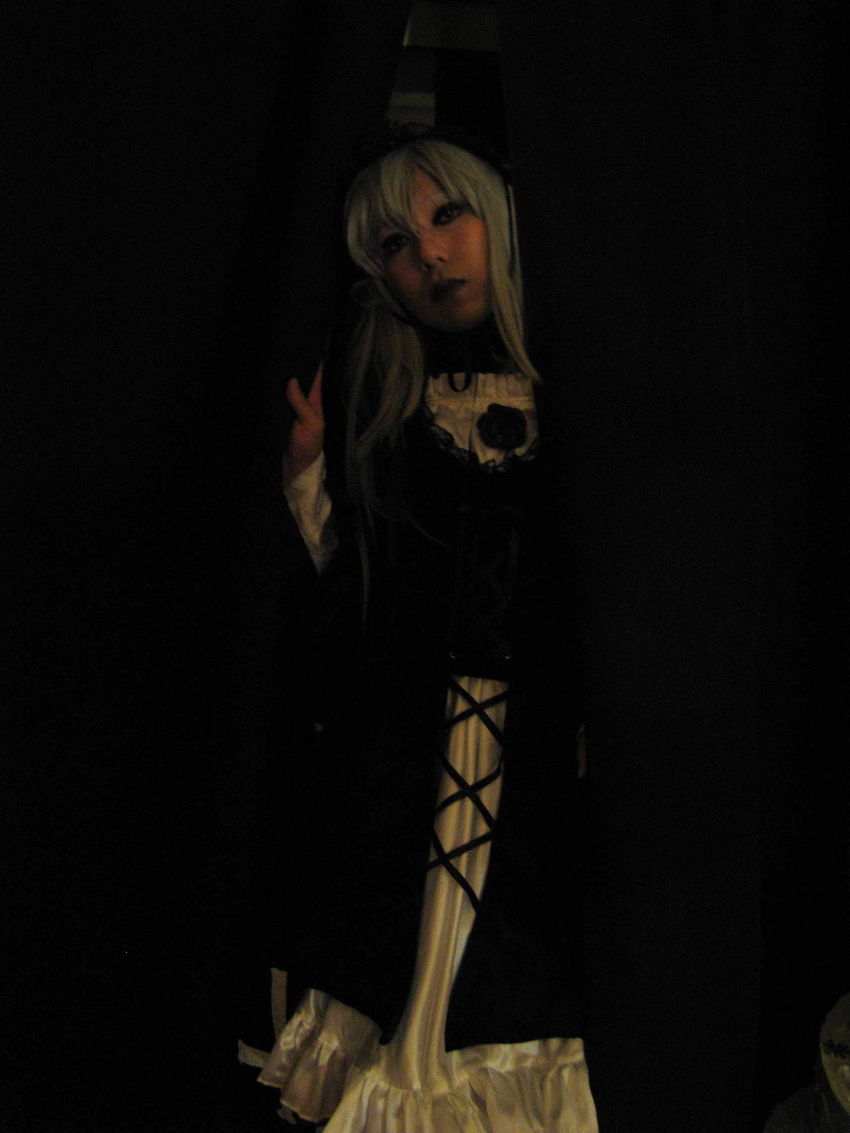 1girl dark dress expressionless long_hair long_sleeves solo suigintou