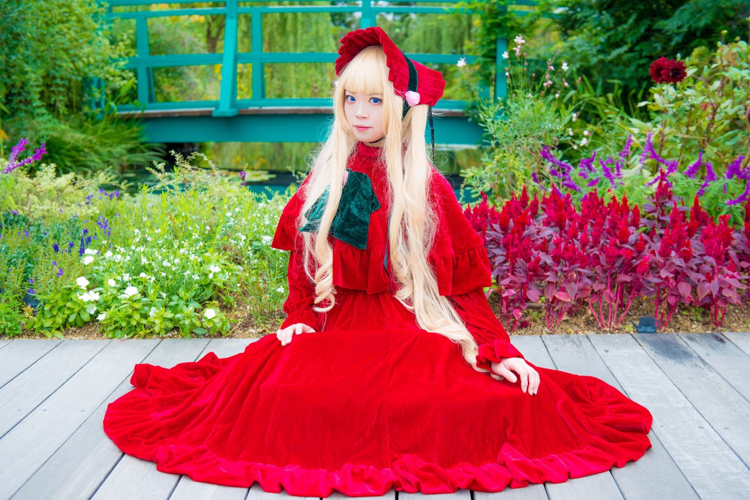 1girl bangs blonde_hair blue_eyes bonnet dress flower hat long_hair long_sleeves looking_at_viewer red_dress shinku smile solo traditional_media very_long_hair