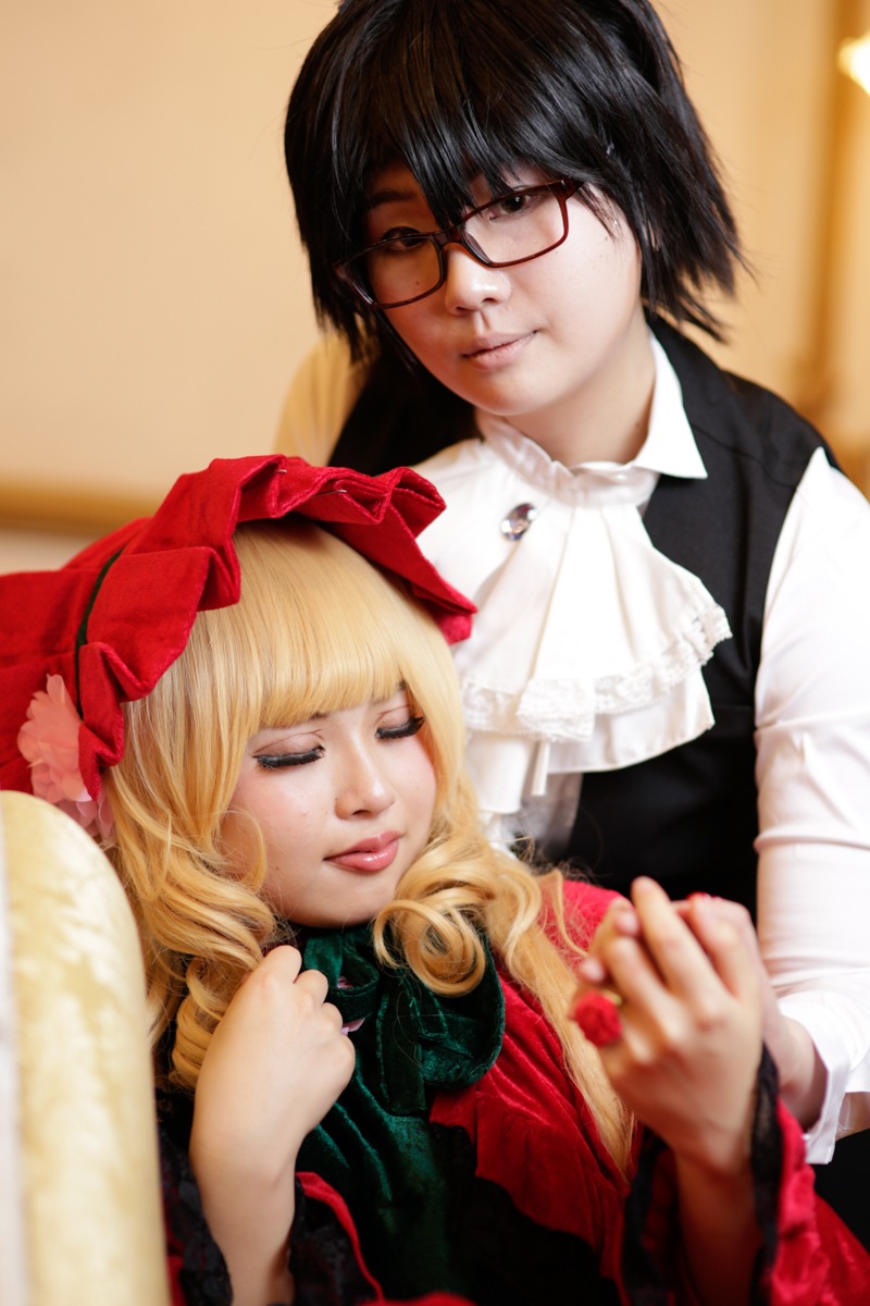 1boy black_hair blonde_hair blurry closed_eyes depth_of_field dress drill_hair glasses lips nose realistic sakurada_jun shinku solo