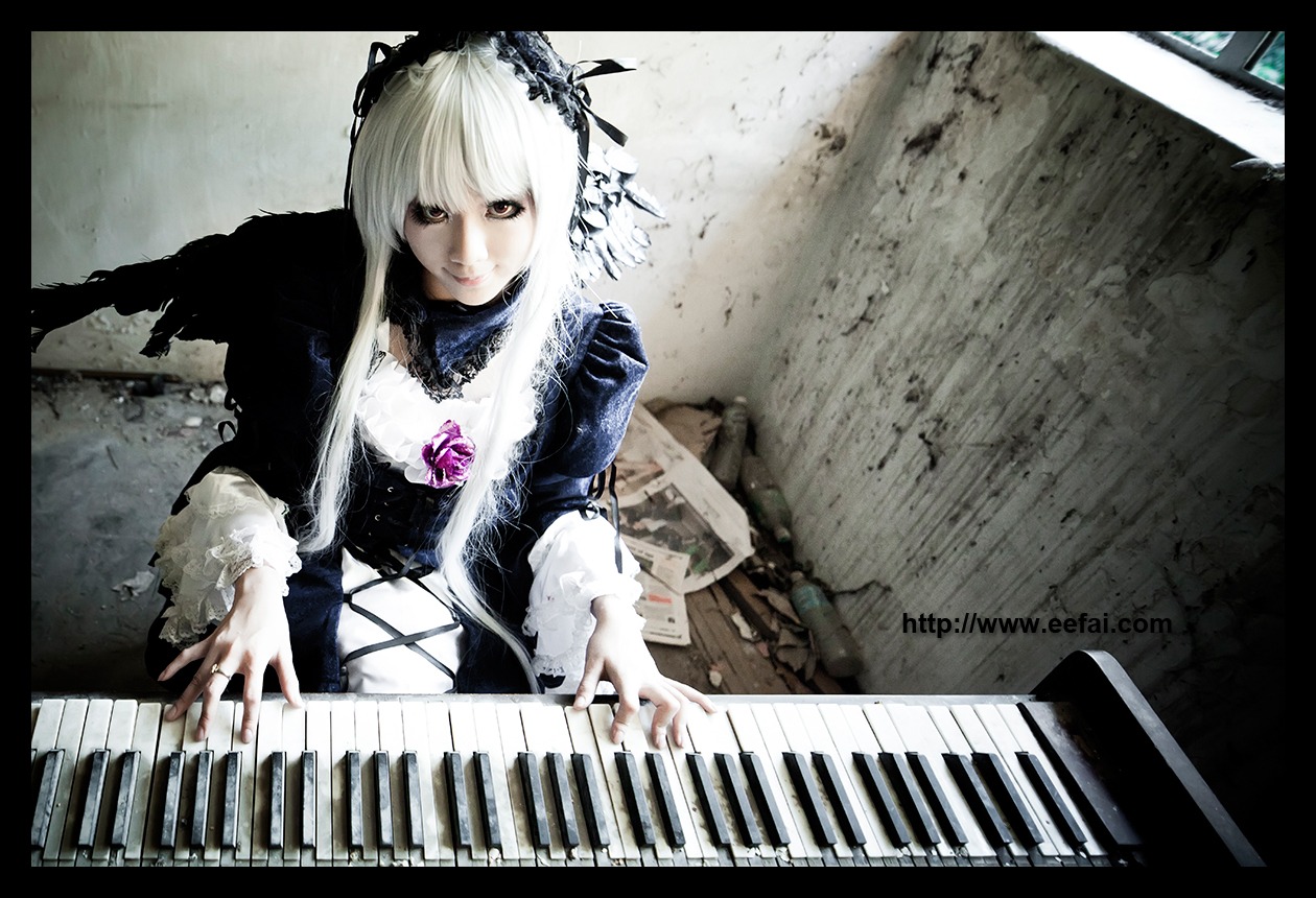 1girl bass_guitar bow_(instrument) dress electric_guitar flower guitar holding_instrument instrument keyboard_(instrument) letterboxed long_hair long_sleeves music piano playing_instrument plectrum silver_hair solo suigintou violin white_hair wings