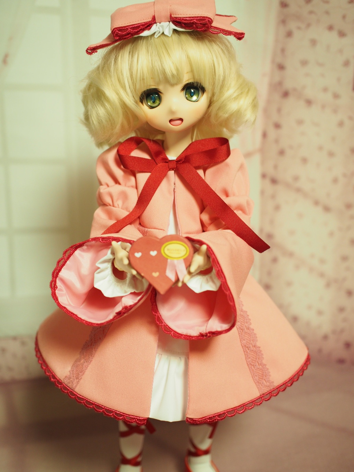 1girl blonde_hair chocolate doll dress green_eyes hina_ichigo hinaichigo looking_at_viewer open_mouth ribbon short_hair smile solo