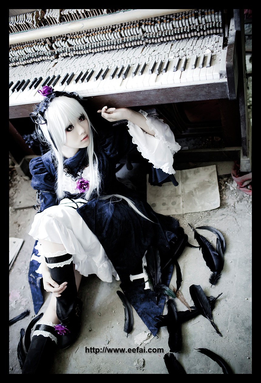 1girl dress frills instrument long_hair solo suigintou