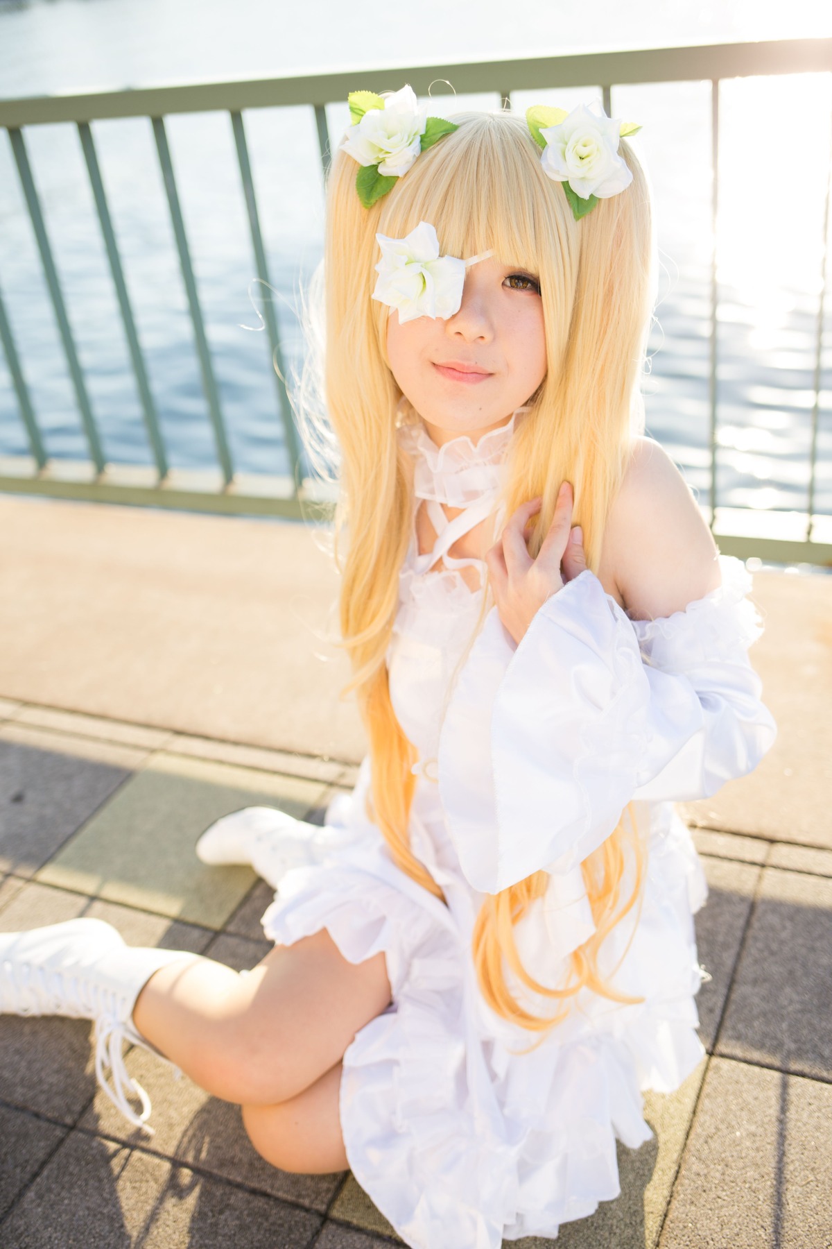 1girl bangs blonde_hair blunt_bangs blurry depth_of_field dress flower hair_flower hair_ornament kirakishou lips long_hair sitting solo tiles white_dress white_footwear